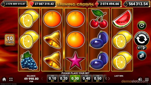 A 5-reel slot game titled Shining Crown displaying a settled grid of fruit symbols, bells, and a star against a red background.