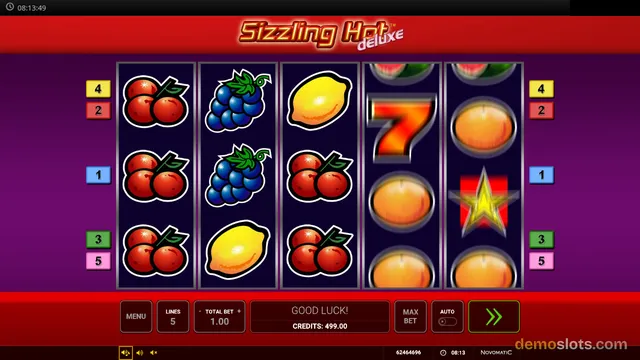 A 5-reel, 3-row slot game titled Sizzling Hot Deluxe shows a settled base game grid with fruit symbols on a dark background.