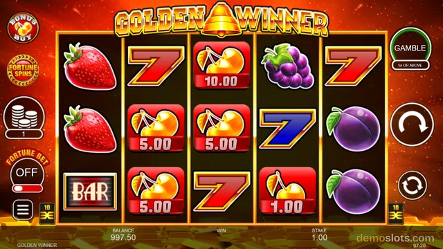 A slot game titled GOLDEN WINNER displays a 5x3 grid of fruit symbols including strawberries, sevens, cherries, grapes, plums, and a BAR symbol.