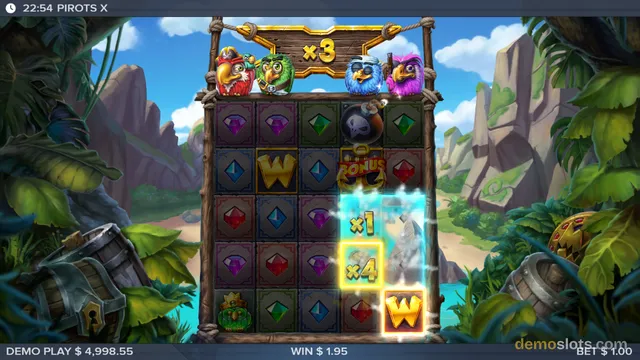 A 5x5 slot game grid displaying gems, a skull bomb, a W logo, and a bonus symbol, with a '×3' multiplier sign and four parrot characters at the top.