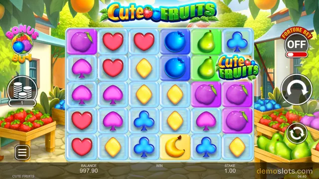 A brightly colored slot game screen titled 'Cute Fruits' shows a 6x5 grid of fruit and card symbols in a sunny orchard setting.