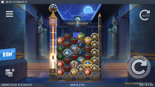 A slot game titled CYGNUS 5 shows a grid of colorful gems and symbols set in an Egyptian temple at night, with a win of $2.70 displayed at the bottom.