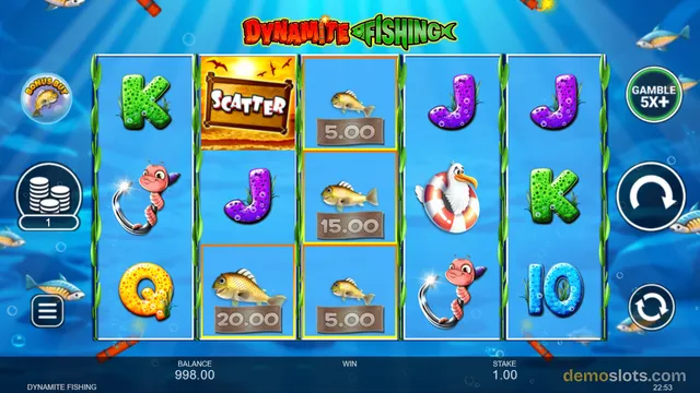 A 5x3 slot grid titled DYNAMITE FISHING shows a Scatter symbol, fish symbols with cash values, and various letter symbols, with a balance of 998.00 and stake of 1.00.