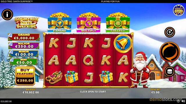 A snowy Christmas-themed slot game shows a 5x5 grid of symbols with Santa Claus standing to the right and three gift boxes labeled EXPAND, MULTIPLY, and COLLECT above the reels.