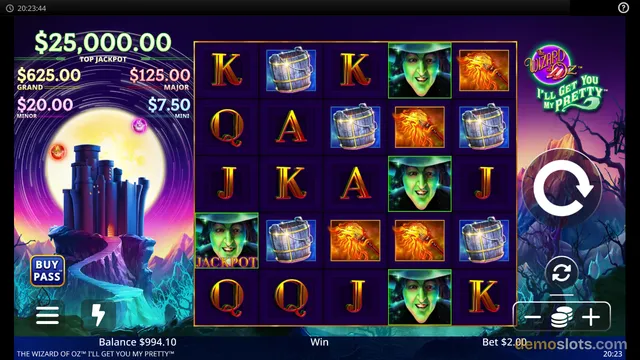 A screenshot of a Wizard of Oz themed slot machine game showing a 5 by 5 grid of symbols including a green-skinned witch, a treasure chest, and a wand on a purple background.