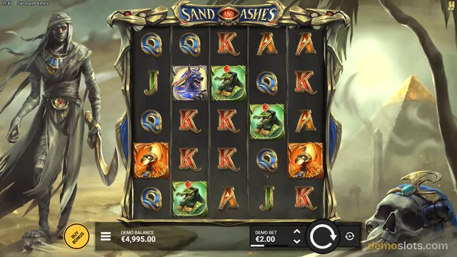 A fully rendered screenshot of the Egyptian-themed slot game Sand and Ashes displaying a 5x5 grid of symbols with a mummy character on the left and a skull on the right.