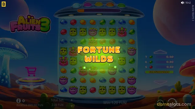 A slot game titled Alien Fruits 3 shows a UFO-shaped reel grid with a glowing Fortune Wilds overlay, set against a space and alien planet backdrop.