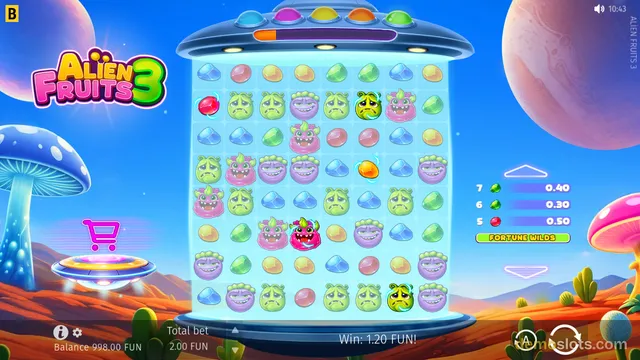 A slot game titled Alien Fruits 3 shows a large 7x7 grid of colorful alien fruit symbols on a blue background with a UFO hovering above.