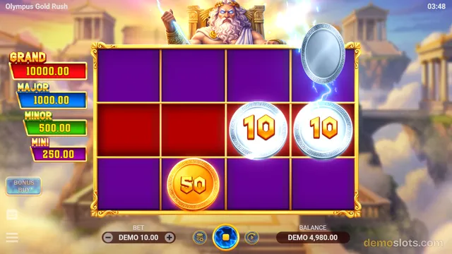 A 5x3 slot game titled Olympus Gold Rush shows a purple grid with a gold 50 coin and two silver 10 coins, with jackpot labels on the left.