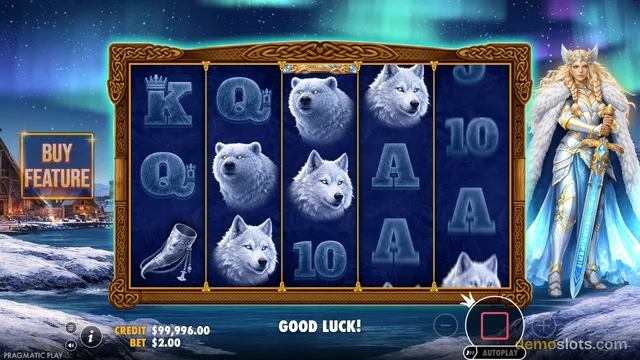 A 5x3 slot game grid displays icy symbols including polar bears, wolves, and card letters, with a warrior queen character standing to the right of the reels under a northern lights sky.
