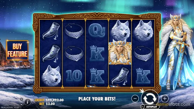 A 5x4 slot game grid with Nordic-themed symbols including a wolf queen character, white wolves, and icy artifacts, set against a snowy village background with aurora skies and a large warrior queen figure standing on the right side.