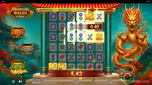 A brightly lit screenshot of the Mahjong Wilds slot game showing a 6x5 grid of mahjong tiles with a large golden dragon on the right side.