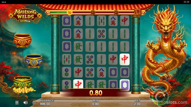 A screenshot of the Mahjong Wilds slot game showing a 6x6 grid of mahjong tiles and a golden dragon on the right side.