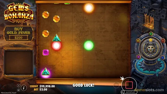A slot game screen for Gems Bonanza displaying a grid of gems, glowing orbs, and a 'GOOD LUCK!' message at the bottom.