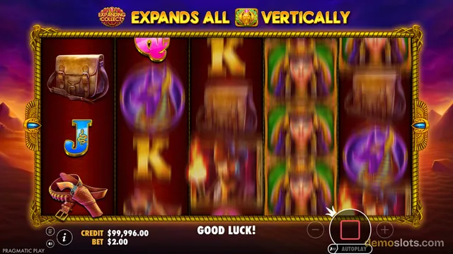 A slot machine with a desert and magic theme is shown mid-spin with a 5x3 grid where the leftmost reel is settled and the others are motion-blurred.