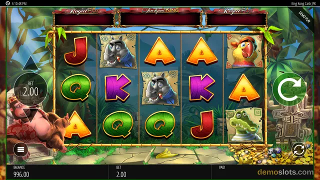 A 5-reel slot game titled King Kong Cash shows a jungle-themed grid with rhino, parrot, crocodile, and letter symbols, with a bet of 2.00 and balance 996.00.