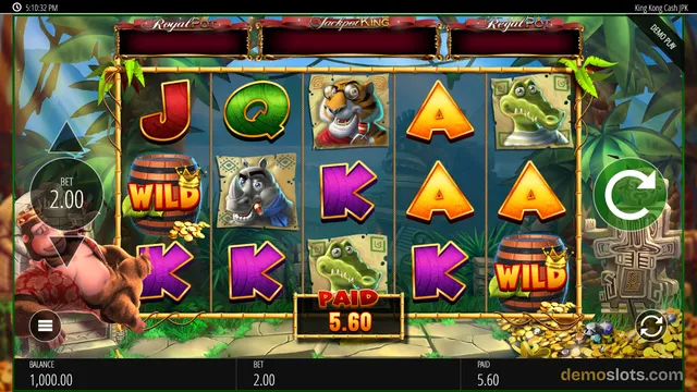 A 5x3 jungle-themed slot game titled King Kong Cash shows a settled grid of symbols with a PAID banner reading 5.60 and a BET of 2.00.