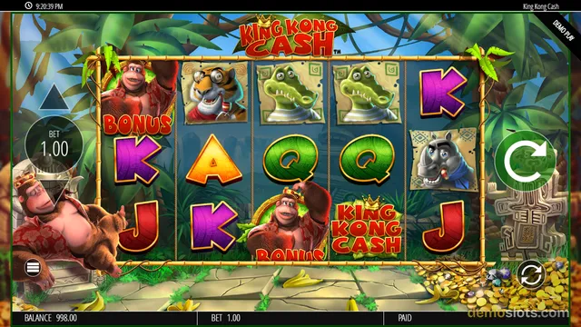 A screenshot of the King Kong Cash slot machine showing a 5x3 grid of jungle-themed symbols including a gorilla, tiger, crocodile, and rhino.